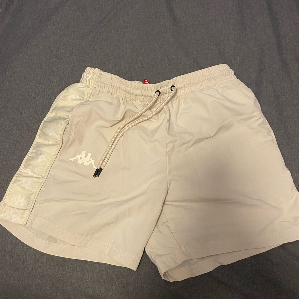 Cream colored kappa bathing suit